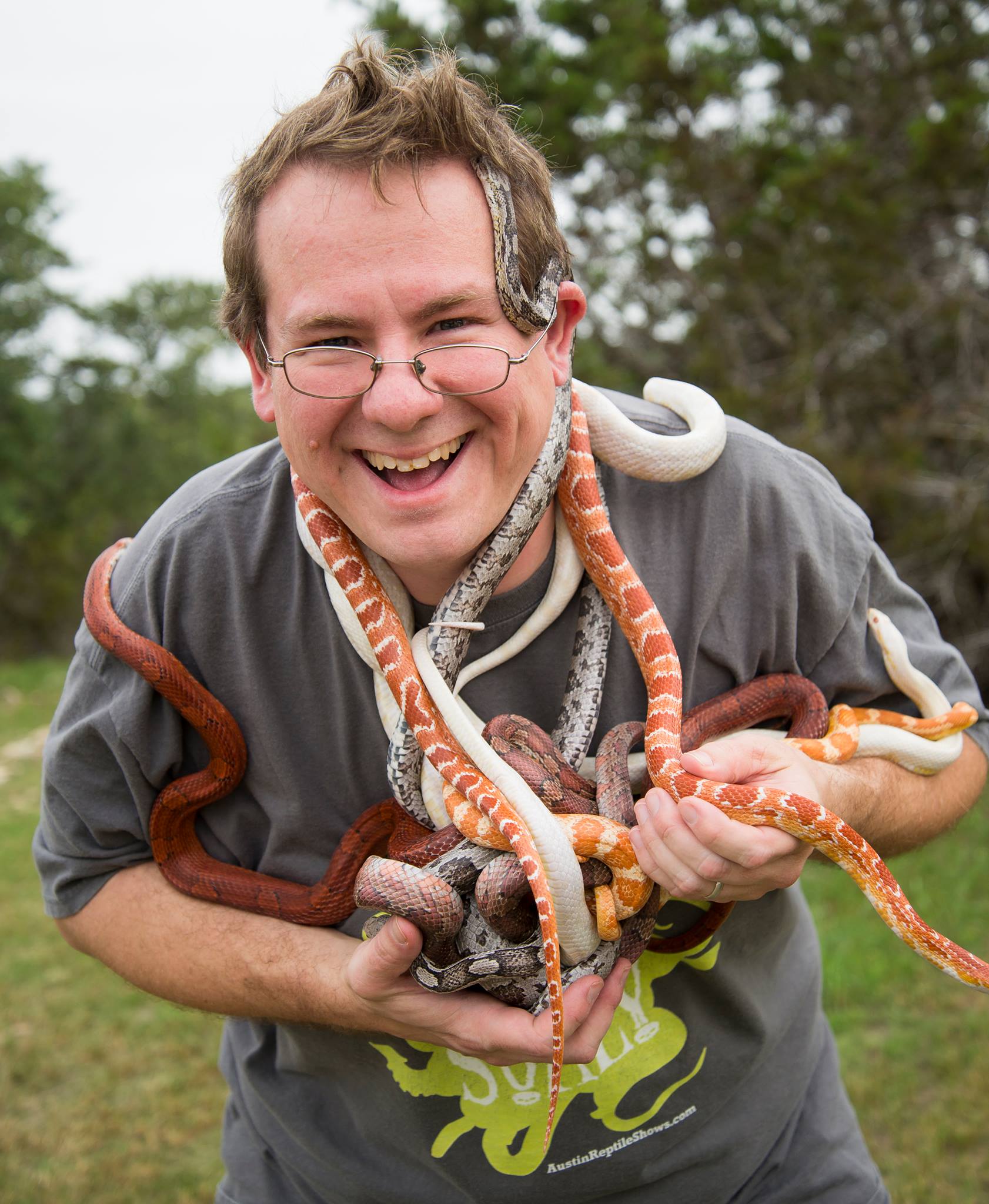 Austin Reptile Performer- Michael foux covered in snakes