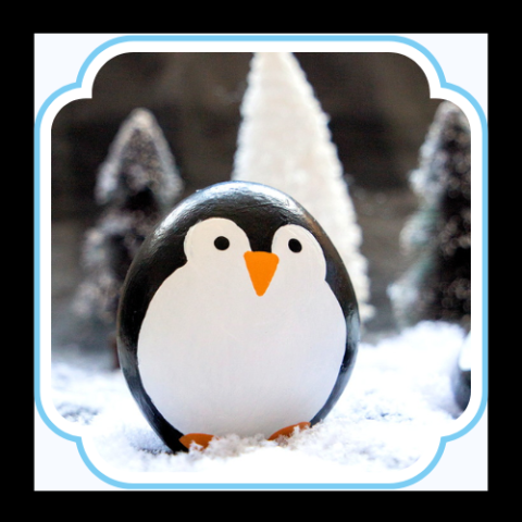 penguin painted on a rock