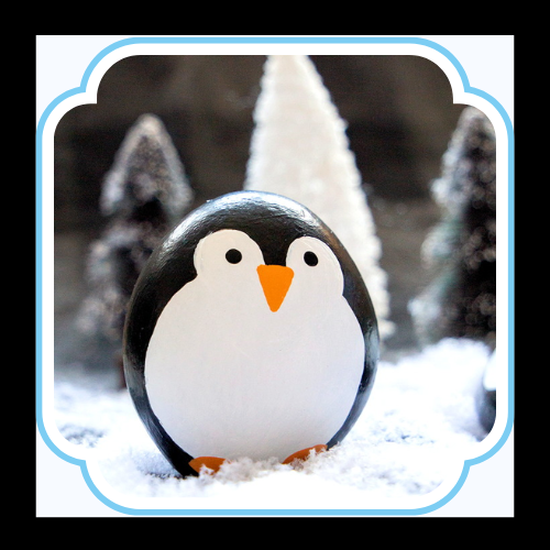 penguin painted on a rock